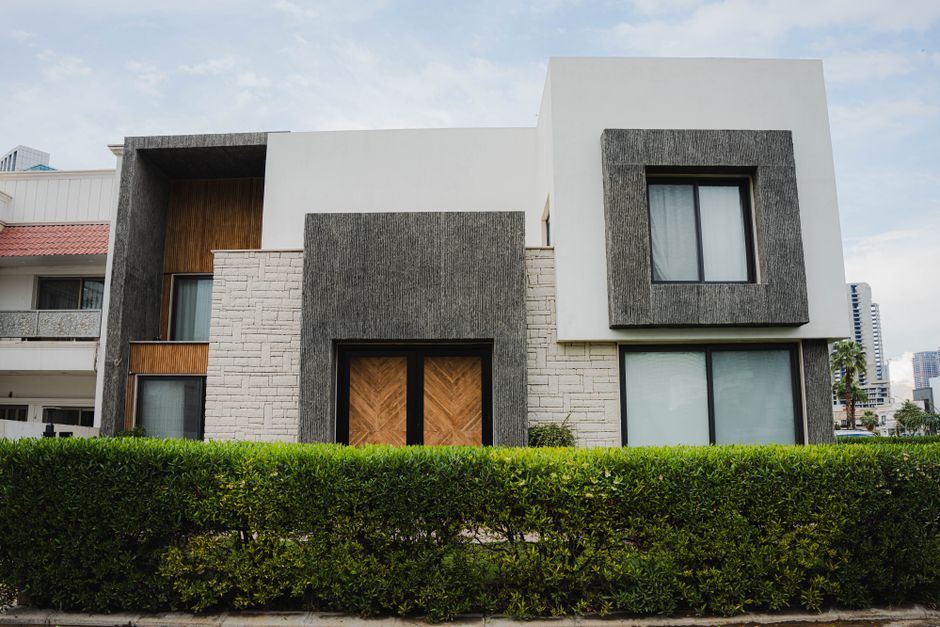 Stunning modern house exterior in Erbil, Iraq showcasing minimal design. It is often considered the best exterior paint for render because it hides small imperfections while adding a high-end architectural feel.